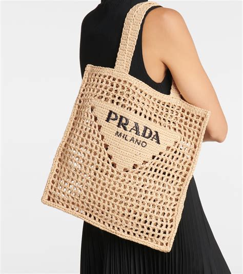 prada raffia beach tote|prada raffia tote natural.